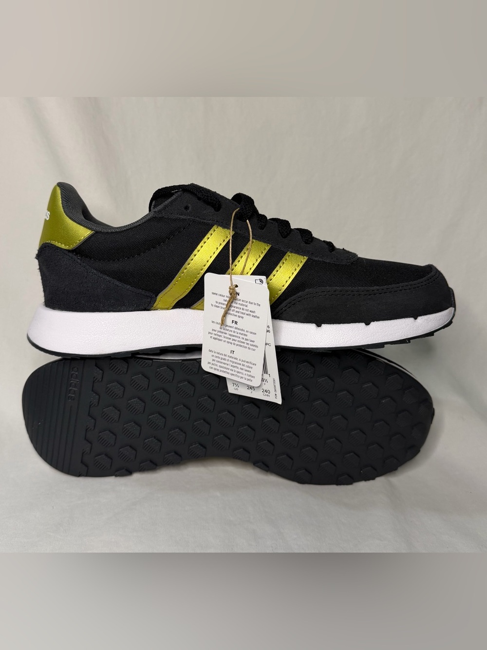 Adidas Black Athletic Sneakers with Metallic Yellow Accents
